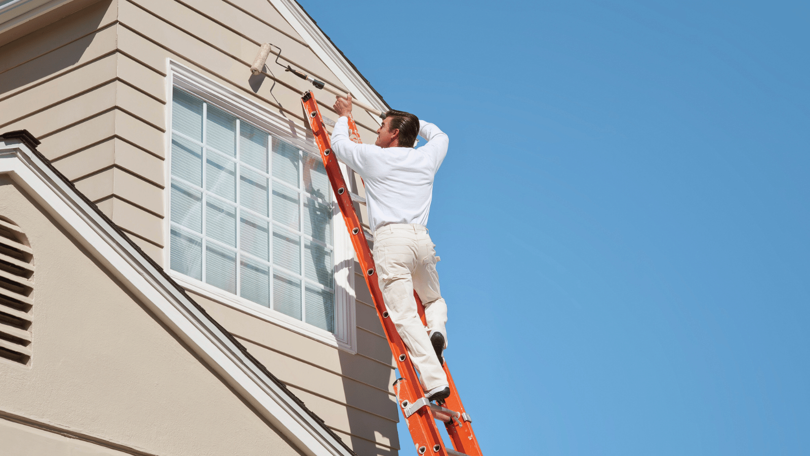 Exterior painting project in progress on Winnipeg home